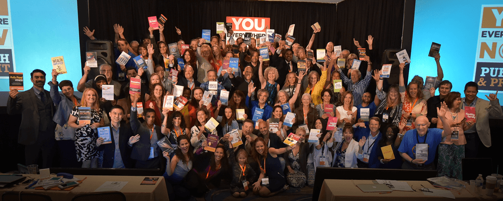 This photo was taken from one of the “Publish and Profit” live events where over 80 participants became #1 bestselling authors in just three days. Over 1,800 people graduated and launched books through this program.